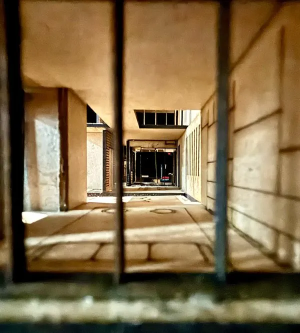 A close-up, eye-level view of the "Heal n Heaven" physical model. This perspective helps us understand the human-scale experience of walking through the building's corridors and spaces.