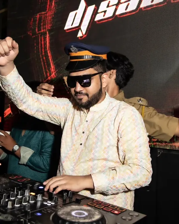 Here I am in my element at a Sangeet, mixing tracks and keeping the vibe alive. I love to have fun with the theme and make sure the music is non-stop.