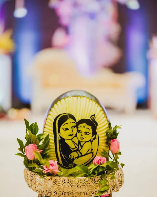 This is where our heart is. We carve the timeless love of Yashoda and her little Krishna onto a fresh watermelon, bringing a touch of divine blessing to your baby shower. It’s a centerpiece that tells a story.