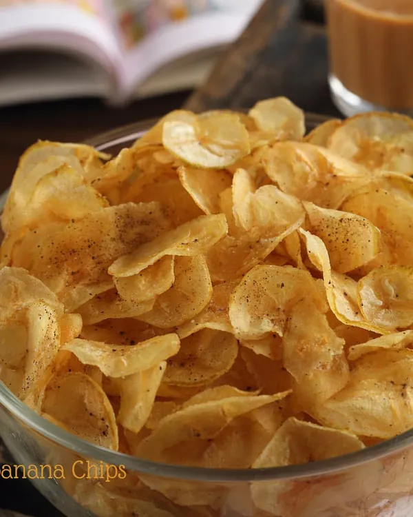 You can't have just one of our homemade Banana Chips. They are thinly sliced, perfectly crisp, and lightly seasoned, making them our all-time bestseller and the perfect companion for your evening chai.