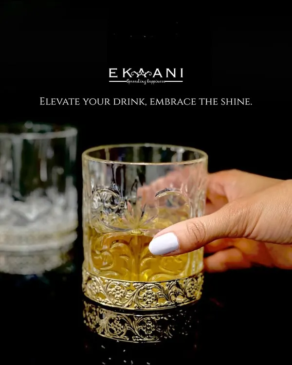 Elevate your drink, embrace the shine. Here is to new beginnings, timeless toasts, and the perfect pour. My crystal whiskey glass with an ornate gold base is designed for savoring life's best moments.