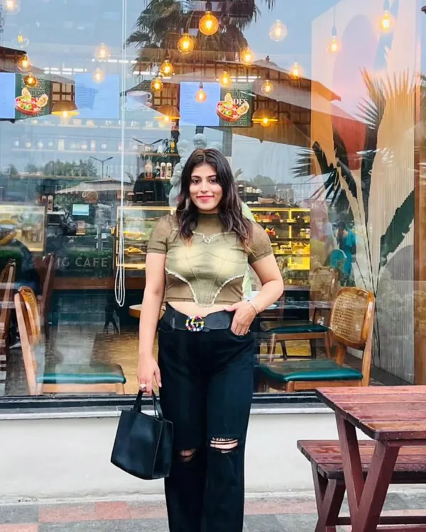 Taking a moment to relax at a cafe. While I am fierce in court, I am friendly and approachable outside of it, which helps me connect with my clients on a human level.