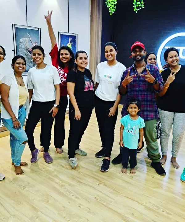 A happy group photo with members of all ages after a fantastic session. This picture captures the inclusive and joyful spirit of our Tap Studio community.