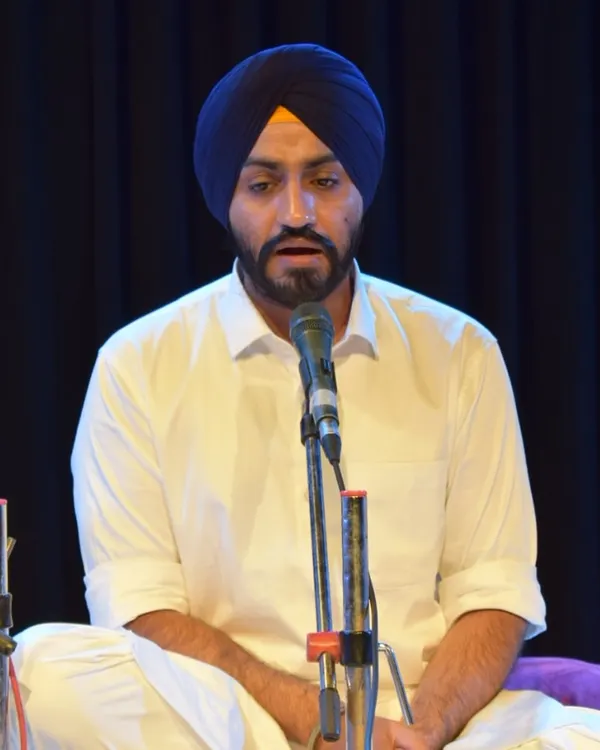 A close-up of one of our senior students leading a Kirtan performance on stage. We train our students to be confident and expressive performers.