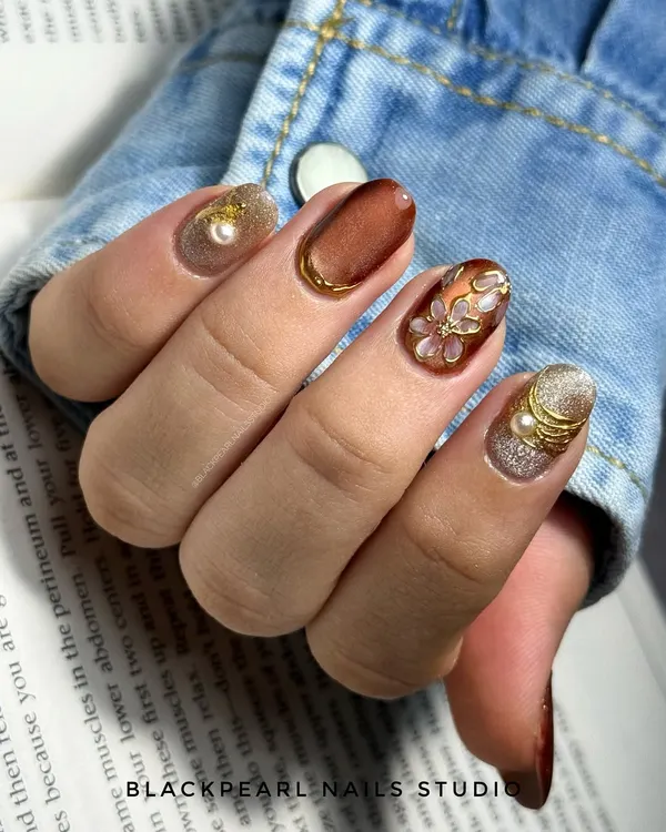 This is what bridesmaid dreams are made of. For this custom set, I combined a glowing cat-eye base with delicate hand-painted flowers, touches of chrome, festive glitter, and elegant pearls to create a look that is both glamorous and romantic.