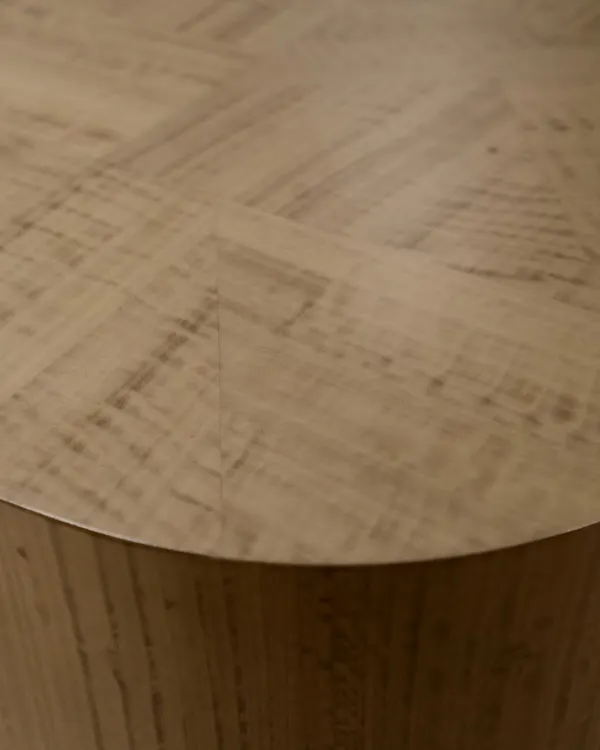 We consider this coffee table a piece of art. It was created by meticulously stitching together small pieces of veneer in different shapes and sizes, resulting in a beautiful, textured surface with a unique pattern.