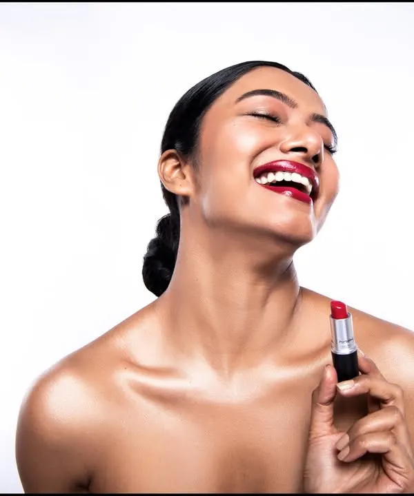 This is the energy I bring to a cosmetics campaign. It's not just about showing a product; it's about capturing the joy and confidence it inspires. I used bright, clean studio lighting to make the red lipstick pop, ensuring the final image is vibrant, sharp, and full of life.