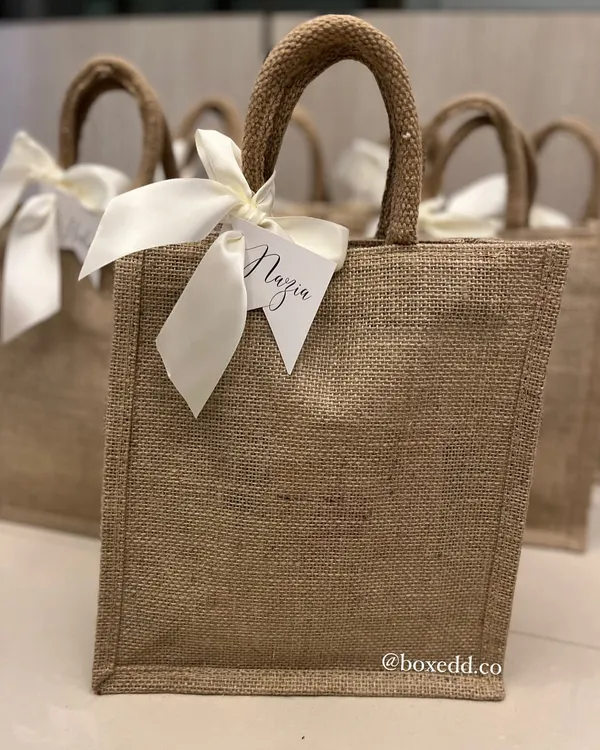 These eco-friendly jute bags are a versatile and stylish option for return gifts. I can personalize them with custom name tags for each of your guests.
