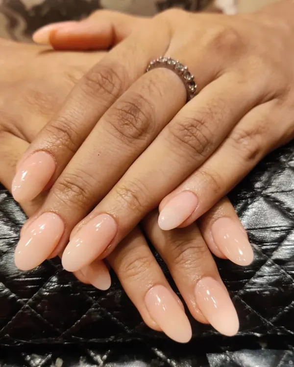 The beauty of a perfectly shaped, natural-looking nude extension. This is the ultimate "your nails but better" look.