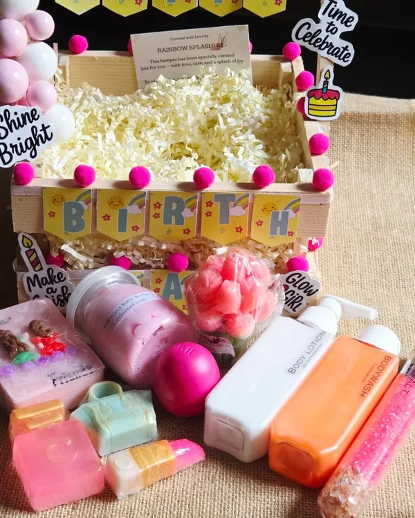 A complete birthday celebration in a box. This vibrant hamper is filled with an assortment of my handmade soaps, body lotion, body wash, and bath salts, all packed into a festive crate.