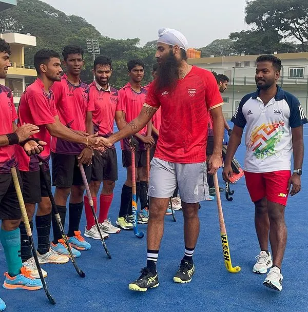 Indian hockey star Jarmanpreet Singh personally congratulating my players after a tough match. This kind of interaction is incredibly motivating for young athletes.