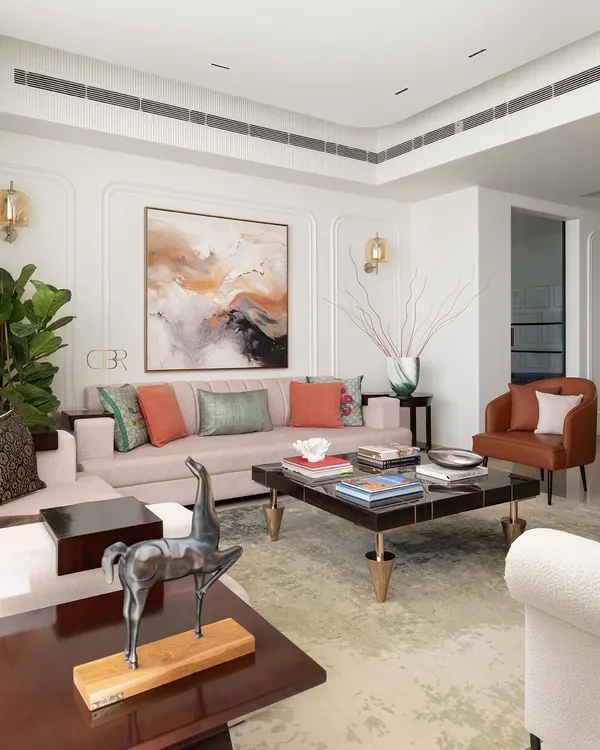 This living room from my Casa Zen project embodies my philosophy of warm minimalism. I designed this space to be a sanctuary, where clean lines and a soft, neutral palette create a sense of calm, while layered textures and curated art add depth and personality. It’s a space that feels both sophisticated and deeply inviting, perfect for a modern family.