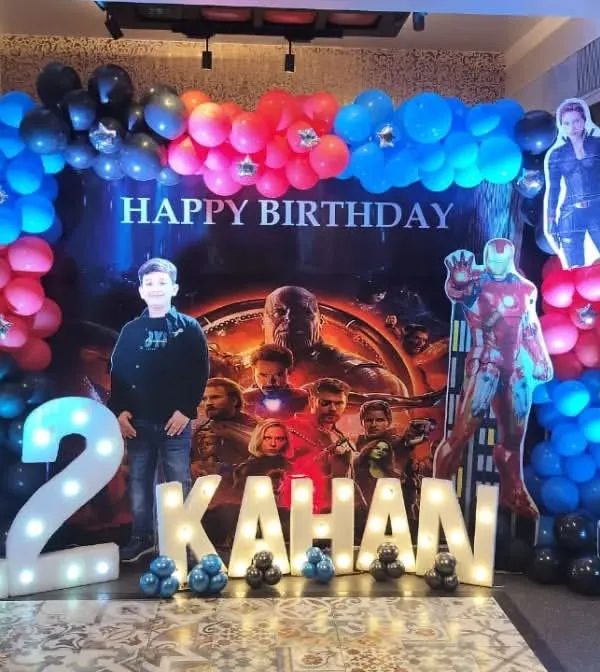 Another shot of the Avengers party, showing the birthday boy with his favorite heroes. We ensure the lighting and props are perfectly placed for great photos.
