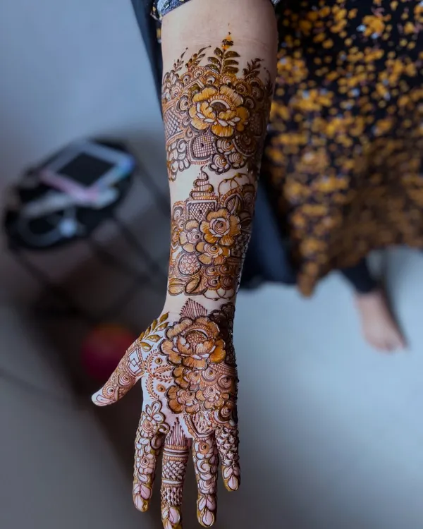 A perfect example of my signature floral design. This full-arm piece showcases a variety of flowers, from bold roses to delicate buds, all shaded for a 3D effect.
