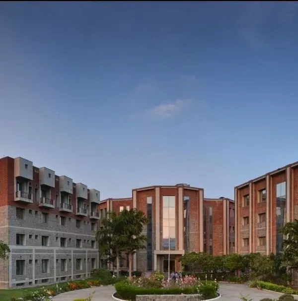 The full campus view of the Institute for Studies in Industrial Development (ISID) in New Delhi. The design connects multiple buildings with open spaces, creating a collaborative environment. The use of exposed brick and stone is a core part of my philosophy for sustainable, low-maintenance public buildings.