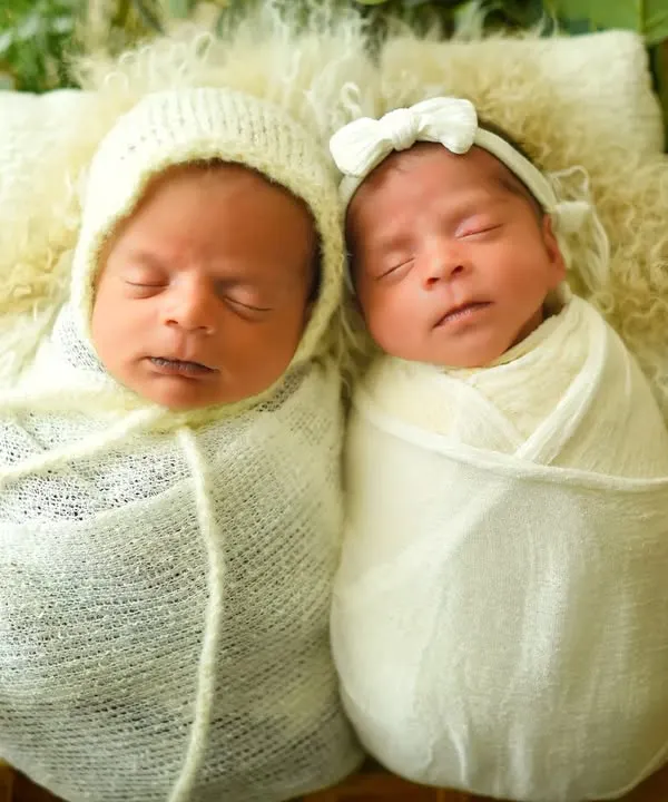 Double the sweetness. As a certified newborn photographer, I specialize in safely posing twins to capture their connection, like this adorable shot of two peacefully sleeping babies.