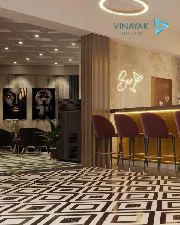 This home bar exudes a moody, luxurious vibe. We used bold geometric floor tiles, plush velvet bar stools, and a neon sign to create a space that feels like an exclusive lounge, perfect for entertaining guests.