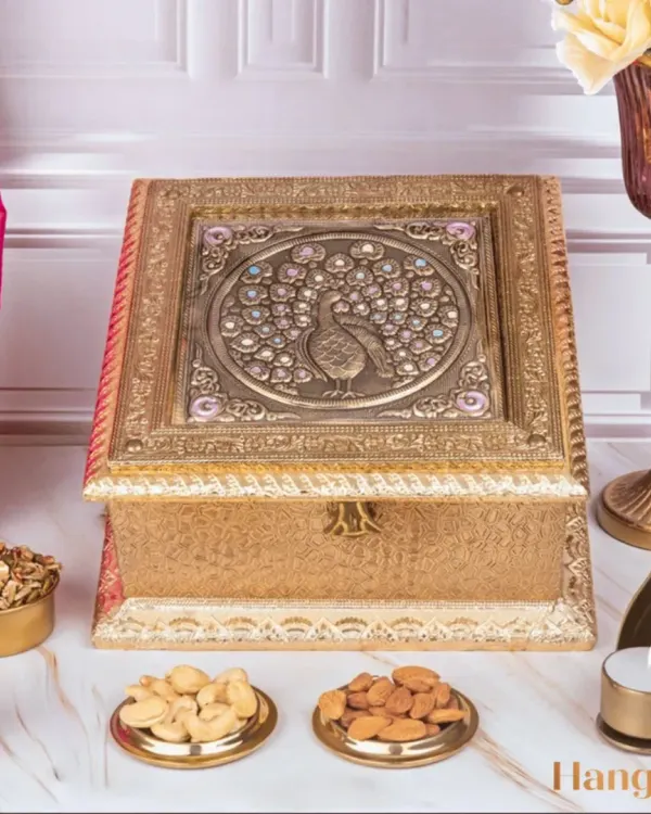 This is my signature sugar-free and gluten-free festive hamper. It brings together wholesome treats like granola, roasted nuts, and guilt-free bliss bars in an ornate peacock-themed box, making it perfect for health-conscious gifting.