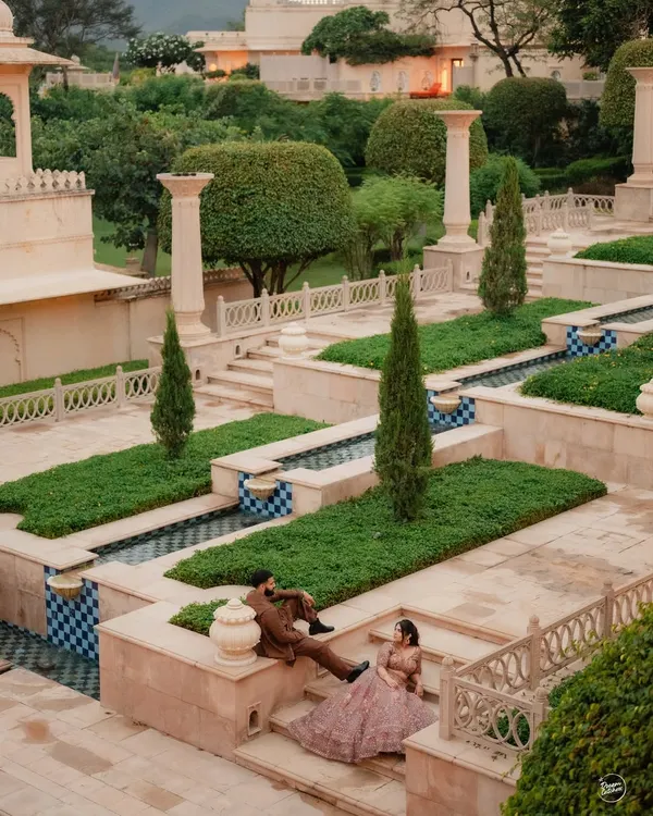A grand portrait of Radhika and Dhyeya amidst the stunning architecture of The Oberoi Udaivilas. This pre-wedding shoot in Udaipur was about capturing their regal elegance in a timeless setting.