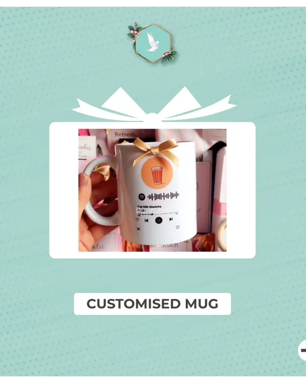 A customized mug featuring a scannable Spotify code for a special song. It's a wonderfully personal way to share a memory or a feeling.