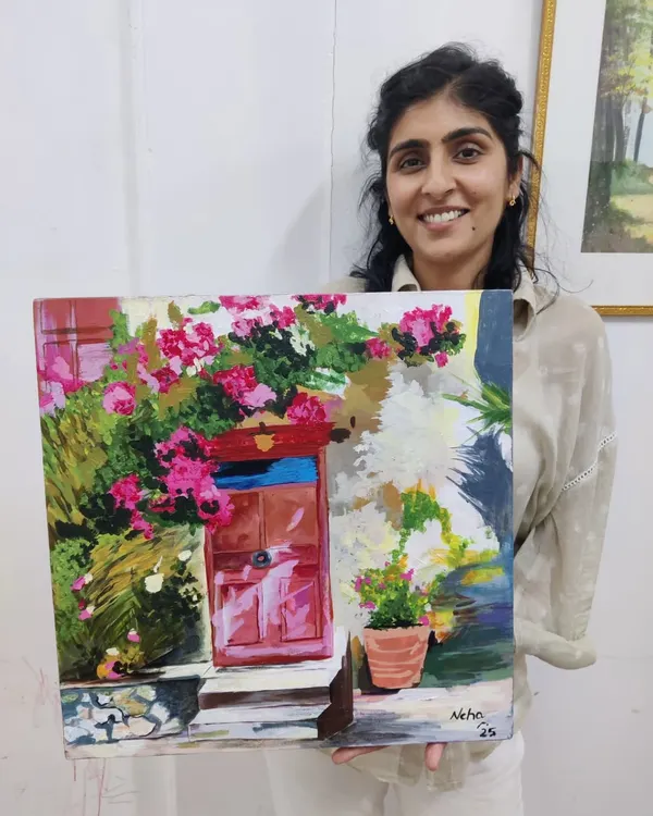 A happy student from our adult art workshop with her beautiful floral landscape painting. It's amazing what you can create in just one session, even as a beginner.