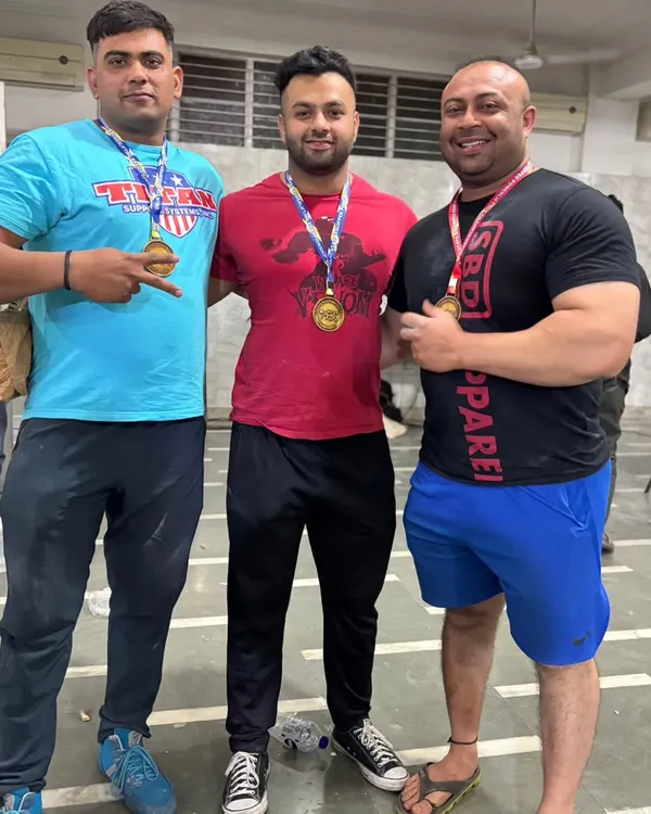 With my brothers in iron, all champions in our respective weight categories.