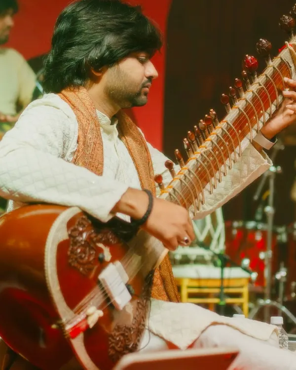 A shot from a live performance with the Tejas & Mitali Collective. I thrive on stage, bringing the soulful, intricate melodies of the sitar to life for the audience. This is where the classical training meets performance energy.