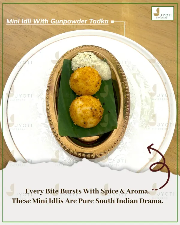 A South Indian classic with a gourmet twist. These Mini Idlis are tossed in a flavorful gunpowder tadka and served with coconut chutney for a perfect bite-sized snack.