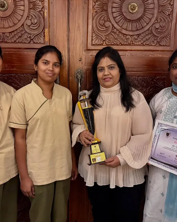 My dedicated team posing with our award. Every achievement is a result of our collective hard work and passion. Teamwork truly makes the dream work.