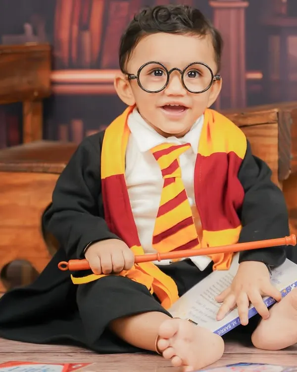 The littlest wizard has arrived. This close-up of our Harry Potter theme shows the detail in the costume, from the iconic glasses to the Gryffindor tie.