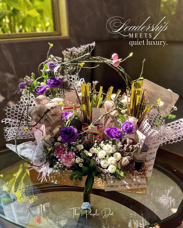 This forest-garden composition is where leadership meets quiet luxury. I created this hamper for a senior executive, layering it with personalized leadership quotes, curated textures, and blooms that reflect depth and presence. It’s a perfect example of gifting that speaks with intention, not volume.