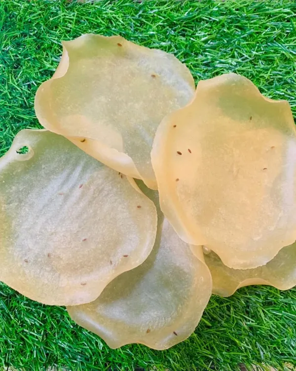 These are my homemade Rice Papads, also known as Khichiya. They are light, crispy, and ready to fry for a perfect meal accompaniment or a standalone snack. The jeera seeds add a lovely aromatic flavor.