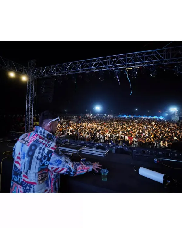 This is the moment I live for. Standing on a massive stage, looking out at a sea of thousands of people, all connected by the music. This is the energy I bring to every large-scale event and festival.