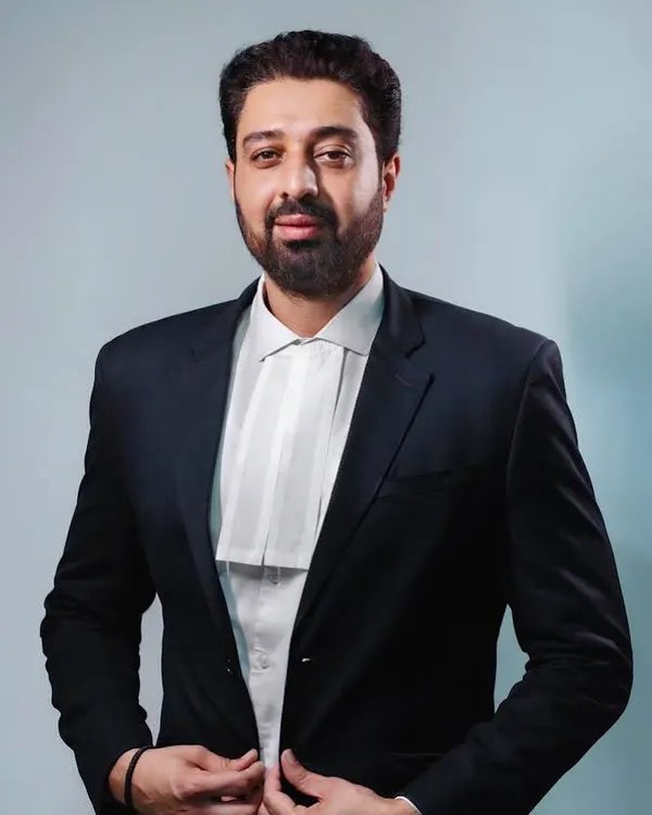 A professional portrait in my advocate's attire. This represents my commitment to the legal profession and my readiness to stand for my clients in court.