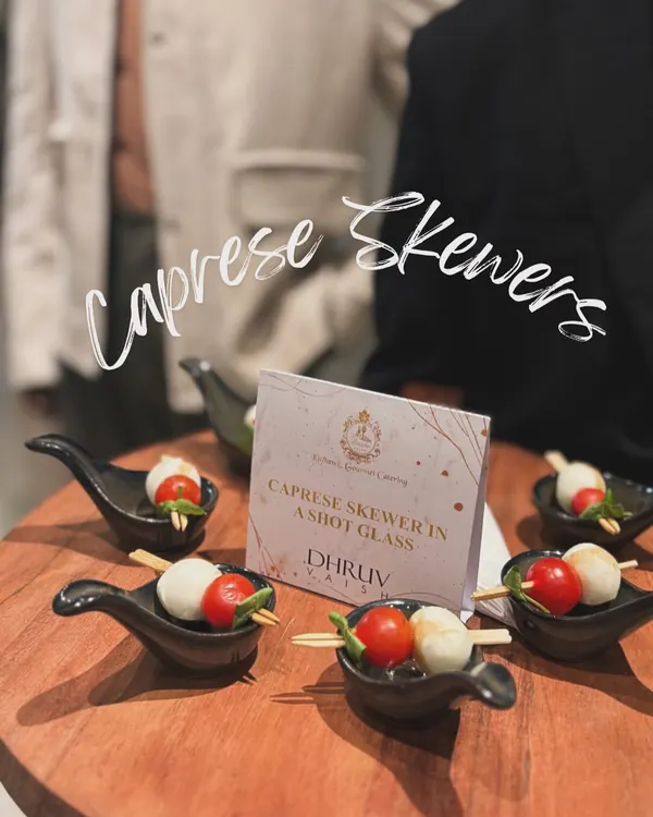 A timeless classic, my Caprese Skewers feature fresh cherry tomatoes, soft mozzarella balls, and basil, served in individual shot glasses for a modern and clean presentation.