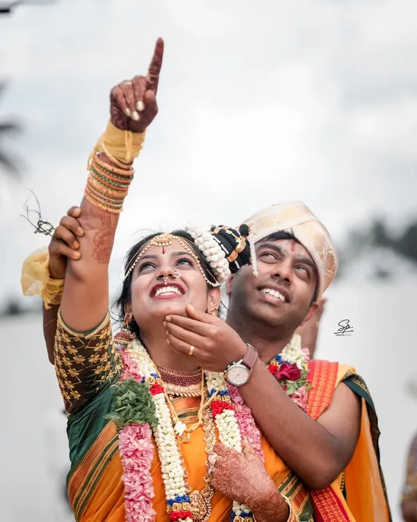 Pure joy during the Muhurtham. We live for these candid moments where the couple's happiness shines through, creating a memory that's both beautiful and completely genuine.
