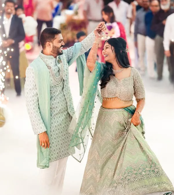We live for moments like these. A grand entrance surrounded by cold pyrotechnics and smoke, creating a truly cinematic and unforgettable start to a wedding reception. This is storytelling through light and emotion.