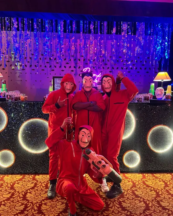 Bella Ciao! Our team is ready for the heist, fully decked out in red jumpsuits and masks. We don't just serve drinks; we become part of the themed experience for your guests.
