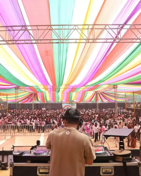 The view from the stage is always breathtaking. Looking out at a massive crowd under a colorful canopy is an incredible feeling.