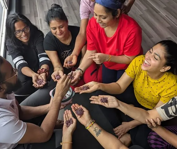 Sharing a moment of connection with my students after class. The bonds we form are just as important as the asanas we practice. Our students are our world.