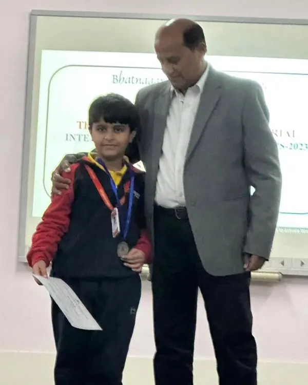 Another win for 8-year-old Raajvansh Kumar. Here he is receiving a silver medal in 10m Air Rifle at the Inter School Shooting Championship, proving that age is no barrier to success in shooting.