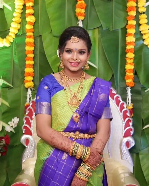 A perfect look for a half-saree function. This young woman rented a full temple jewellery set to match her traditional outfit.
