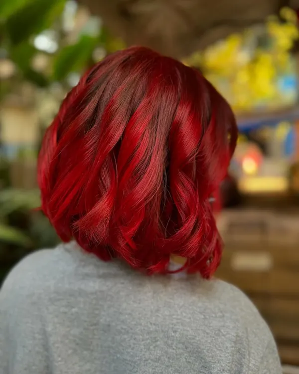 Another look at this fiery red bob. The color is so vibrant and the cut is super sharp. (No filter)