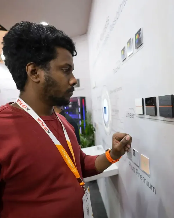 A visitor at the Smart Home Expo 2024 interacting with our Plus Premium keypad display. Events like these are a great opportunity for us to get direct feedback on our products.