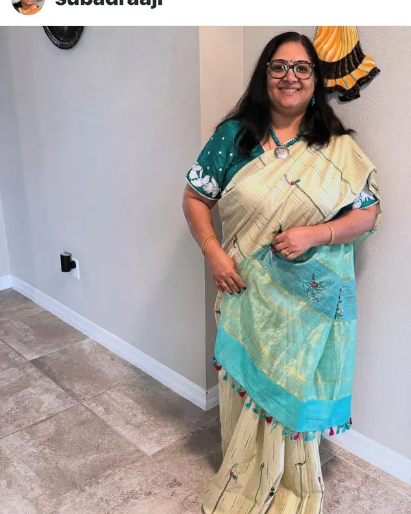 A client looking beautiful in a saree I embroidered for her. It is always a pleasure to receive photos and see my creations become part of someone's special day.