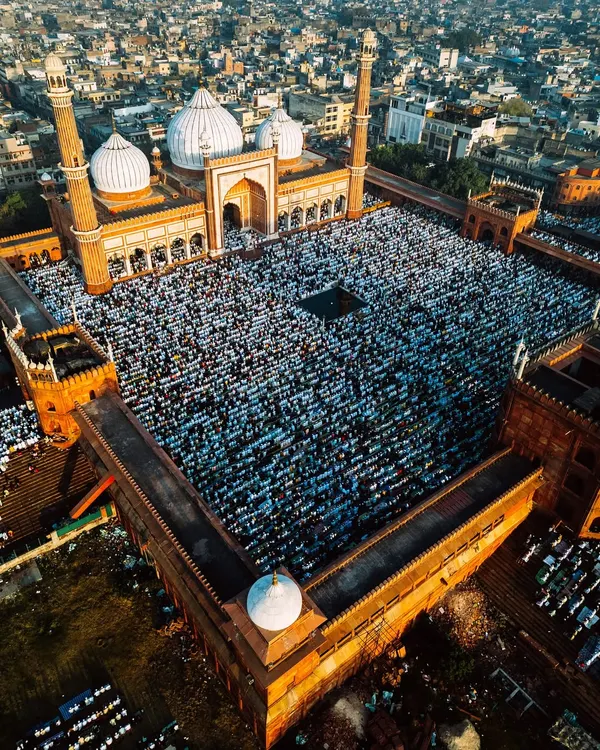 This aerial view captures the immense scale of devotion during Eid-ul-Fitr prayers at Delhi's historic Jama Masjid. As a licensed drone pilot, I aim to find perspectives that tell a larger story of community and faith.