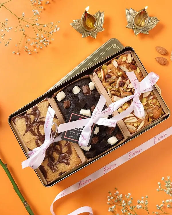 Introducing my luxury tin boxes for gifting. This one is filled with an assortment of my most popular brownies, tied with a beautiful ribbon.