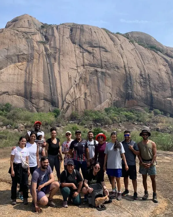 This is us. A whole crew of adventurers taking on the massive rock faces near Bangalore. It's all about getting out there together and making the most of our Sunday mornings.