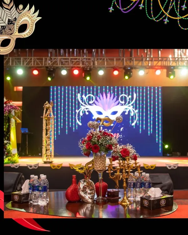 For a corporate celebration, I designed this entire masquerade ball theme. The setup included a custom stage with a large LED screen displaying thematic graphics, professional lighting trusses, and elegant table arrangements to create a mysterious and beautiful atmosphere.