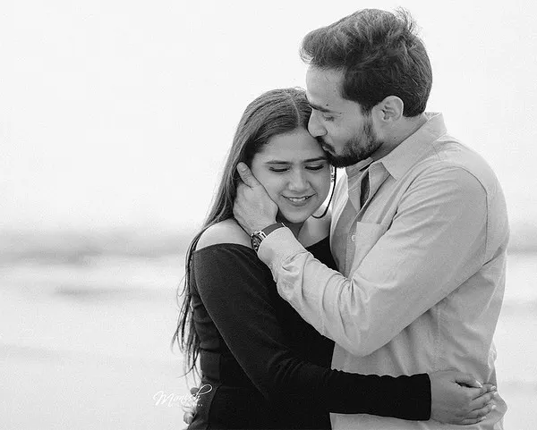 A tender black and white portrait, filled with emotion and intimacy. This classic style emphasizes the connection between the couple.